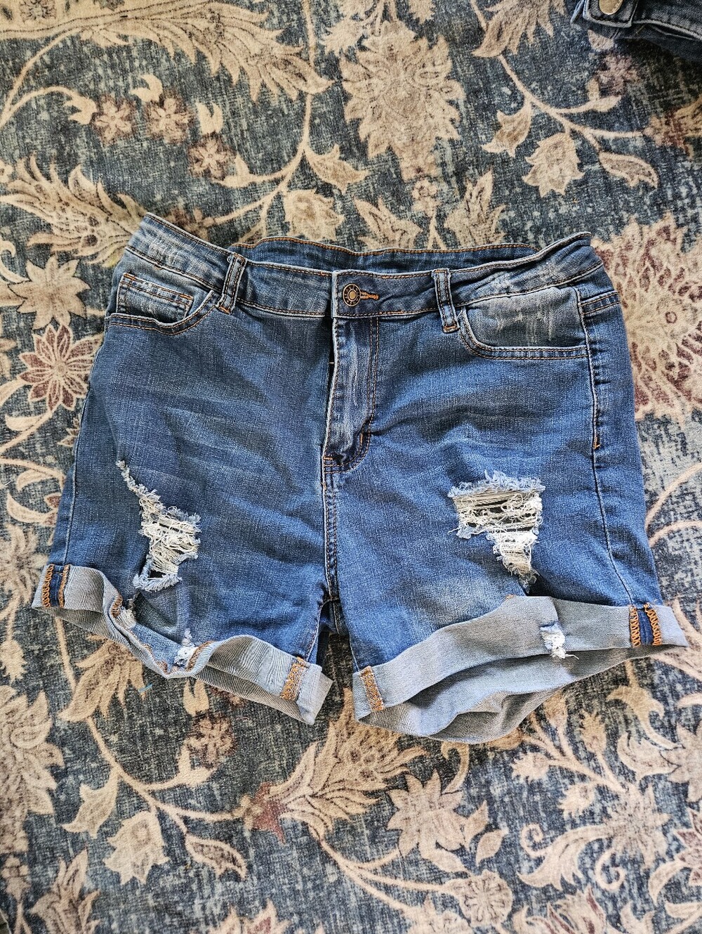 Women’s Distressed Blue Denim Roll-Cuff Shorts